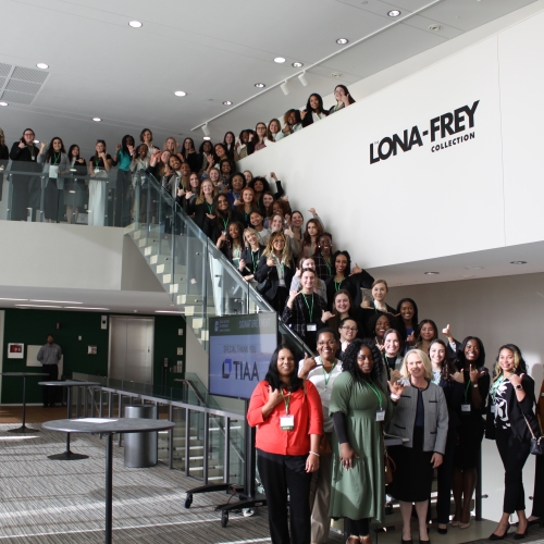 All attendees for Women in Business Signature event on the stairs of the Dubois Center